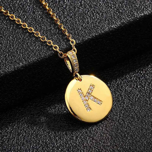Zircon Initial Disc Necklace Collection