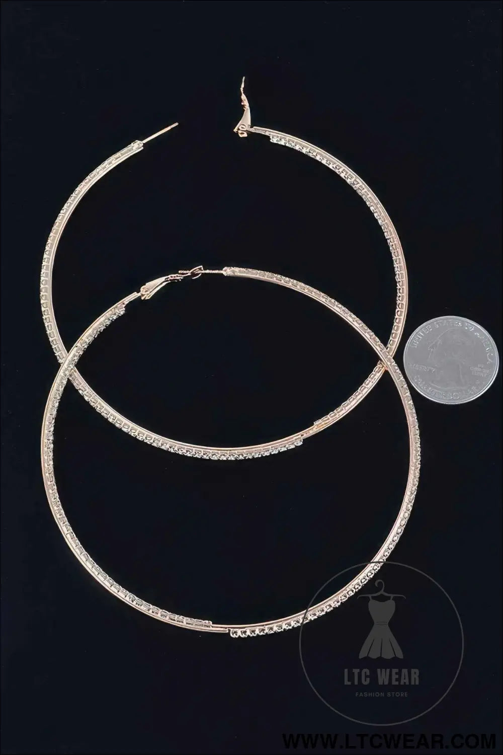 Thin Hoop Earrings With Rhinestone Details.