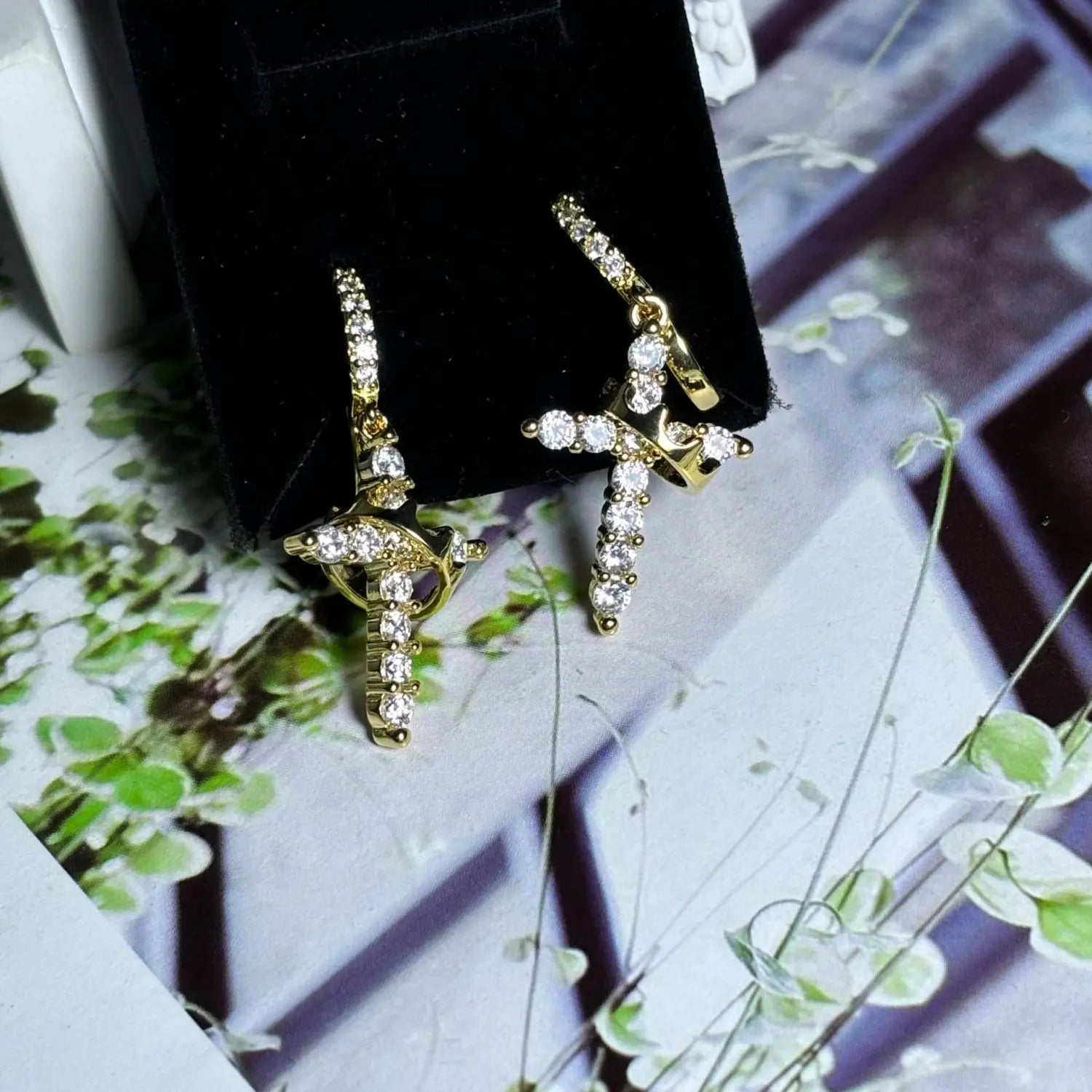 Rotating crown cross earrings set with zircon