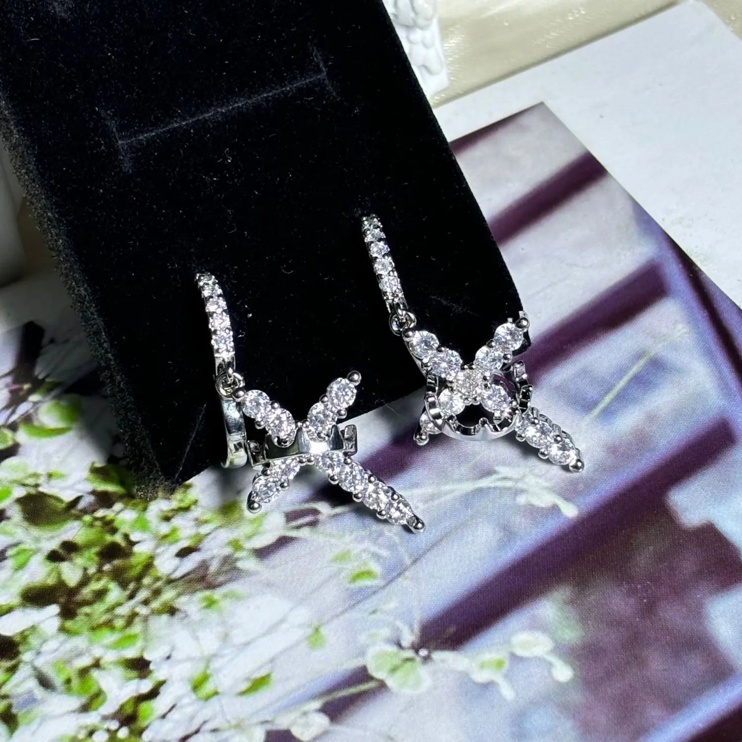 Rotating crown cross earrings set with zircon