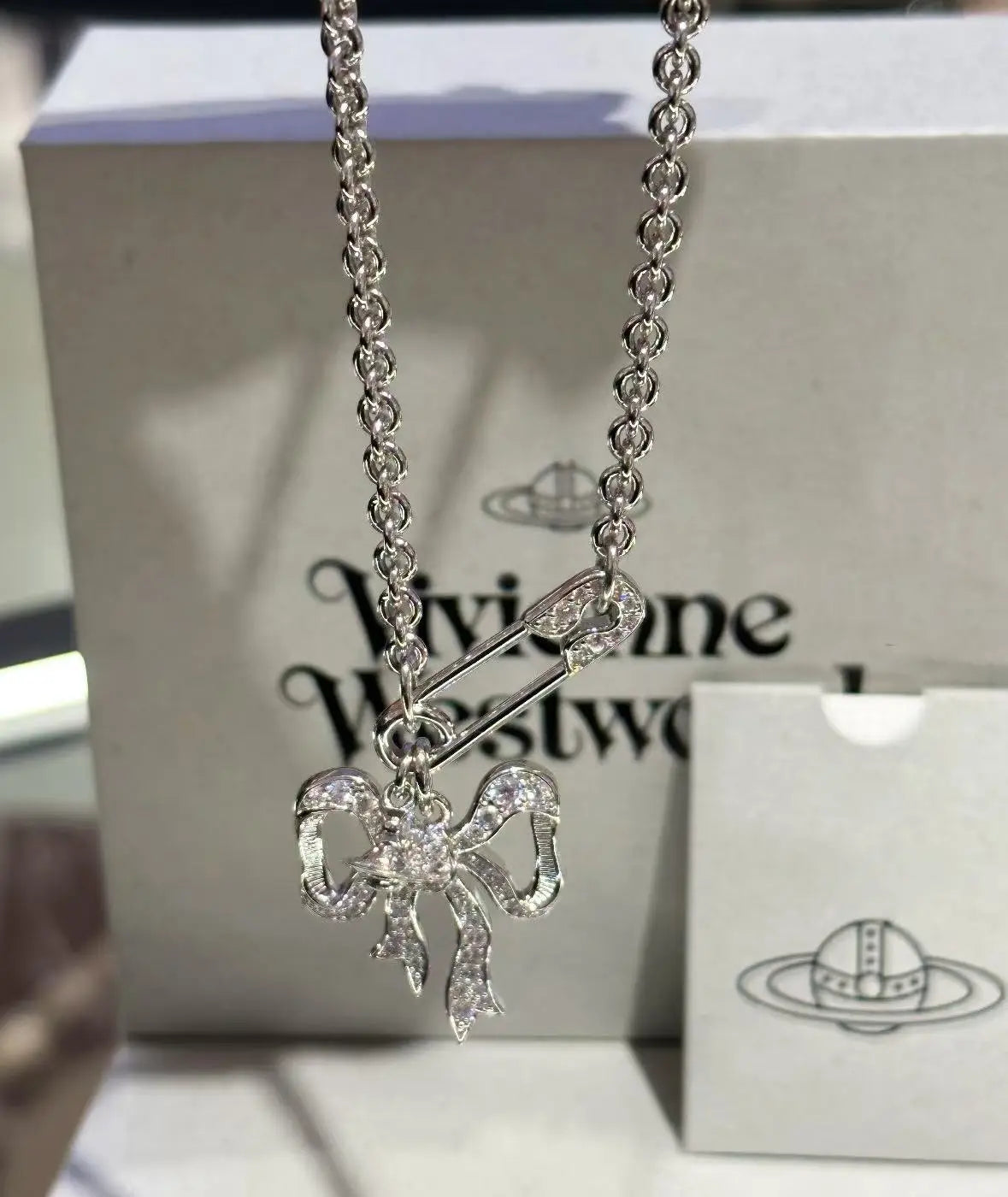 Bow chain necklace and earrings