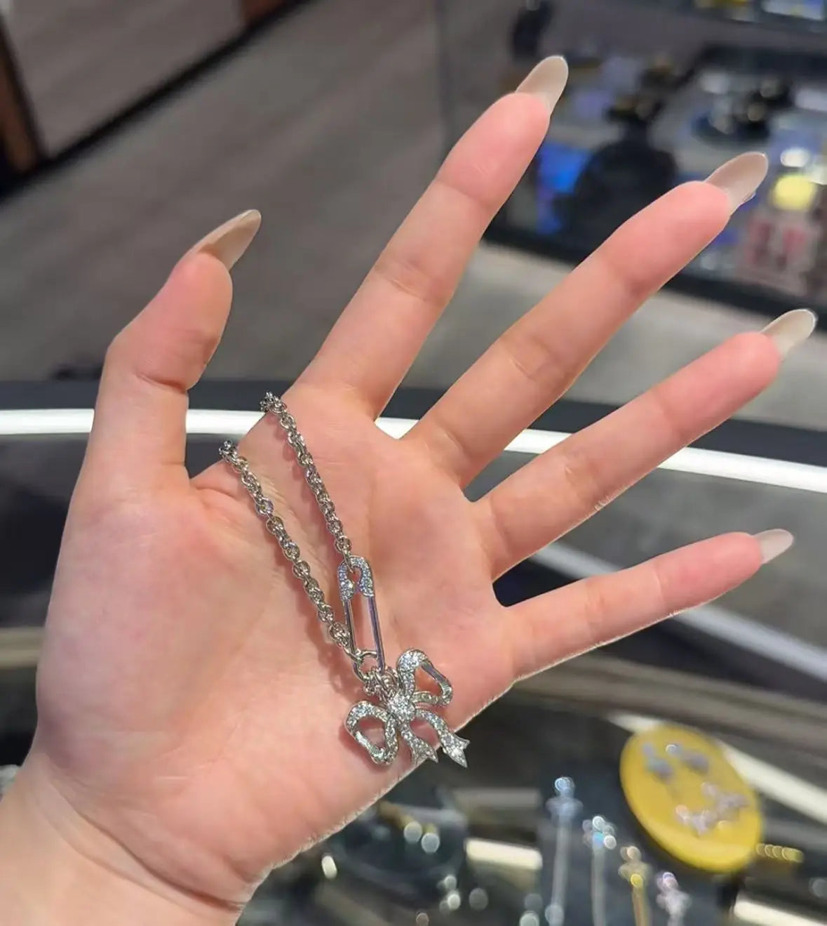 Bow chain necklace and earrings