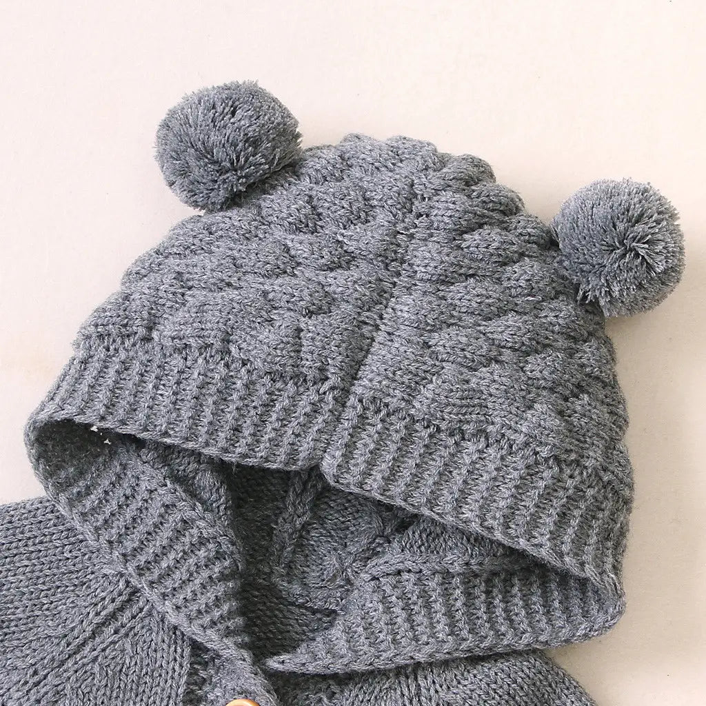 Children’s three-dimensional fur ball hooded solid color knitted jumpsuit