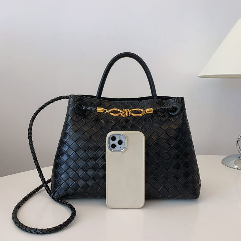 Metal rope buckle woven shoulder bag fashionable versatile retro commuter bag for women.