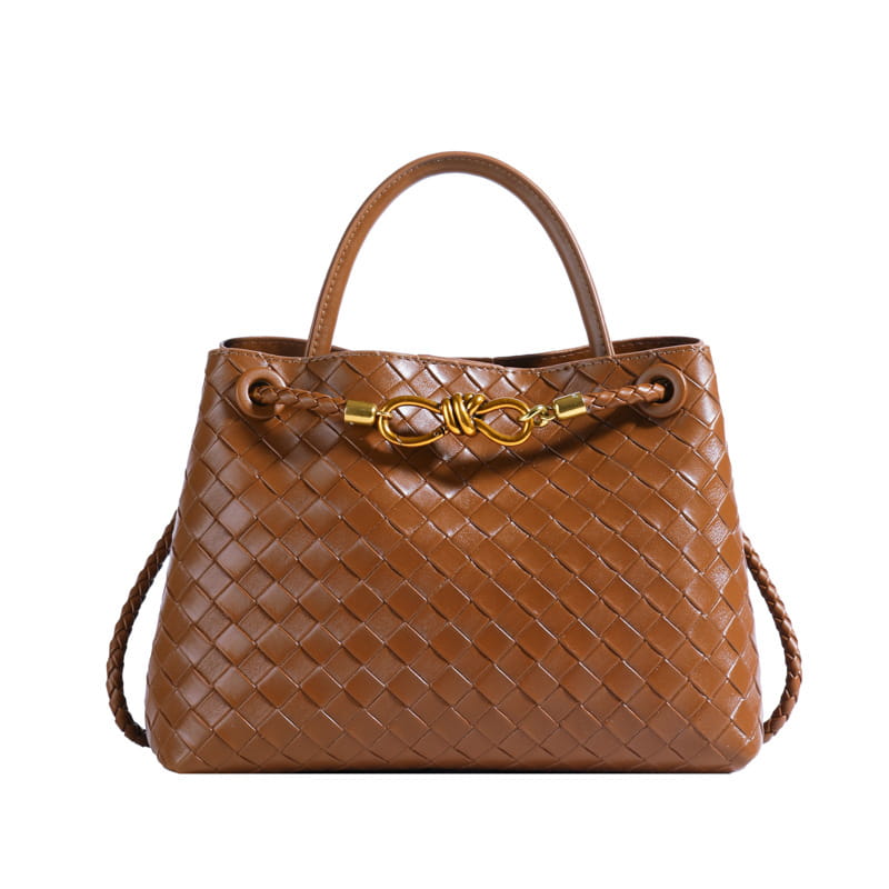 Metal rope buckle woven shoulder bag fashionable versatile retro commuter bag for women.