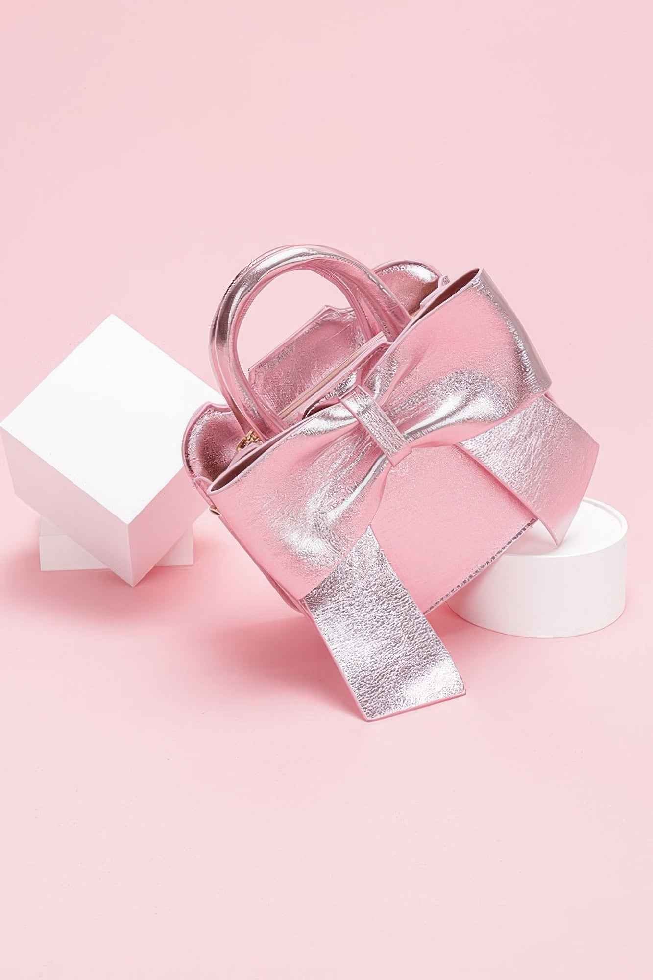 Metallic Bow Front Top Handle Clutch