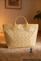 Beige eyelet flower pattern pvc glossy waterproof tote bag - beige / one size / 95% pu + 5% alloy - handbags