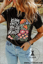 Black bloom where you are planted floral heat transfer printing t shirt - graphic tees