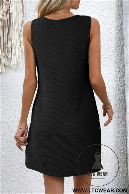 Black solid color textured lace hollowed detail sleeveless mini dress - mini dresses
