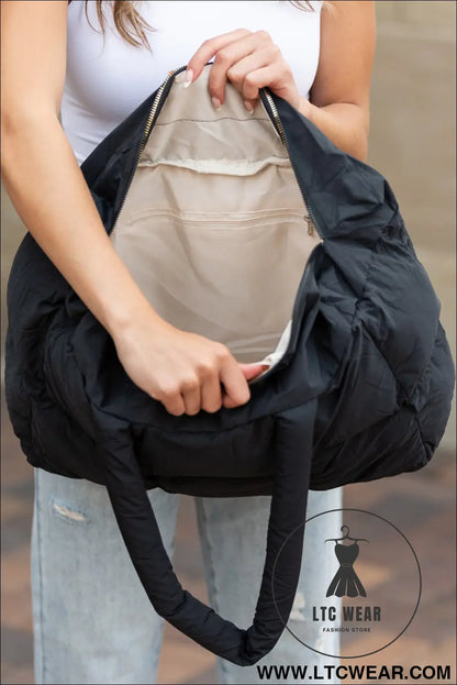 Black solid quilted puffy zipped large tote bag - color black / one size / 100% polyester - handbags