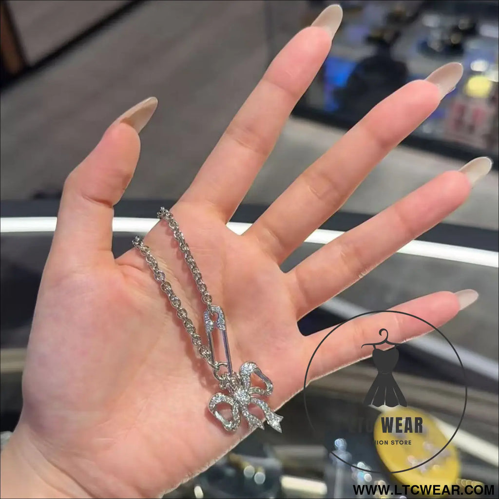 Bow chain necklace and earrings