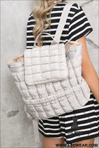 Medium grey solid flapped quilted puffer backpack - medium grey / one size / 100% polyester - backpacks