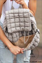Medium grey solid flapped quilted puffer backpack - medium grey / one size / 100% polyester - backpacks