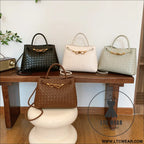 Metal rope buckle woven shoulder bag fashionable versatile retro commuter bag for women.