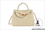 Metal rope buckle woven shoulder bag fashionable versatile retro commuter bag for women.