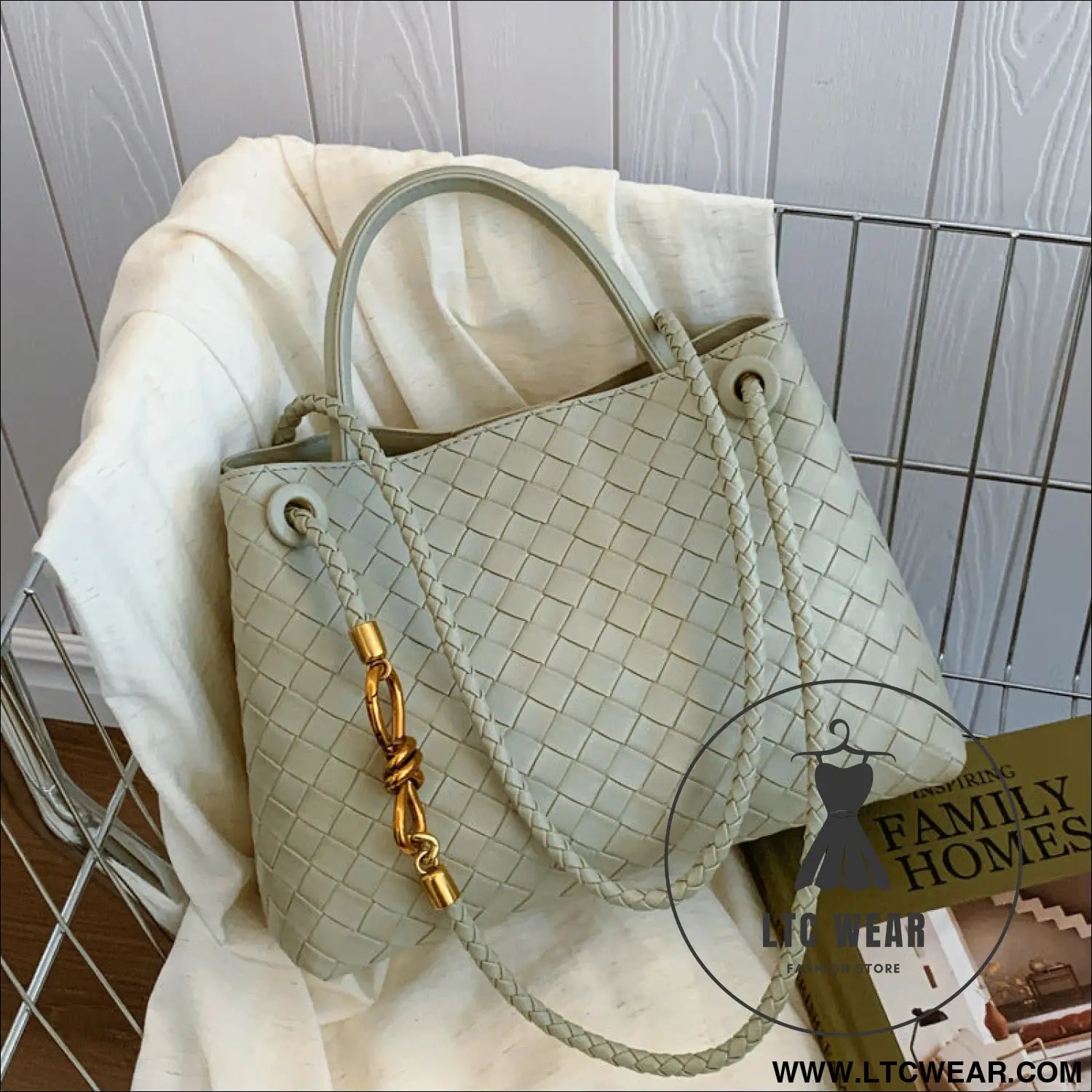Metal rope buckle woven shoulder bag fashionable versatile retro commuter bag for women.
