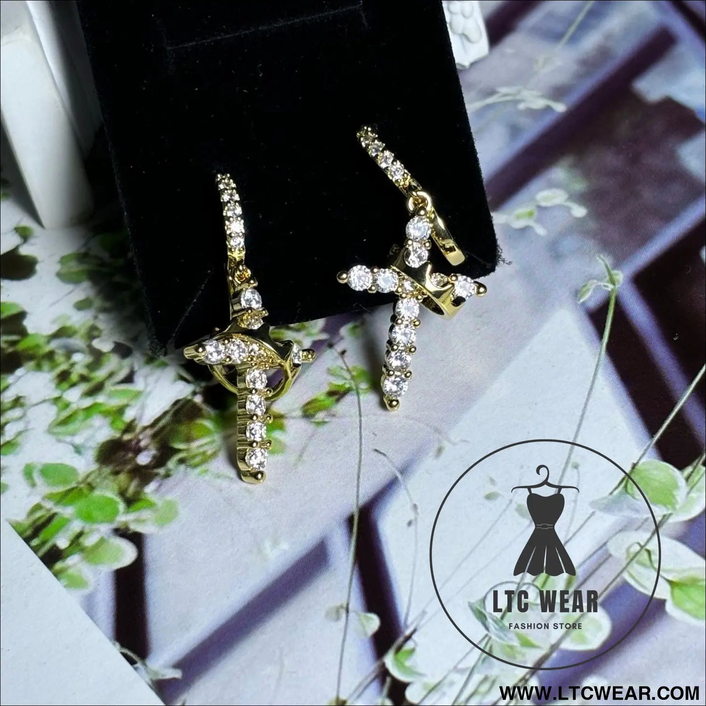 Rotating crown cross earrings set with zircon - golden earrings