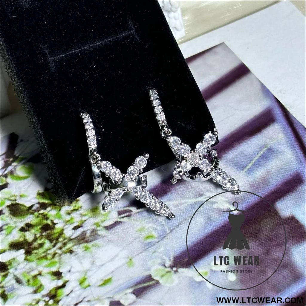 Rotating crown cross earrings set with zircon - silver earrings