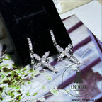 Rotating crown cross earrings set with zircon - silver earrings