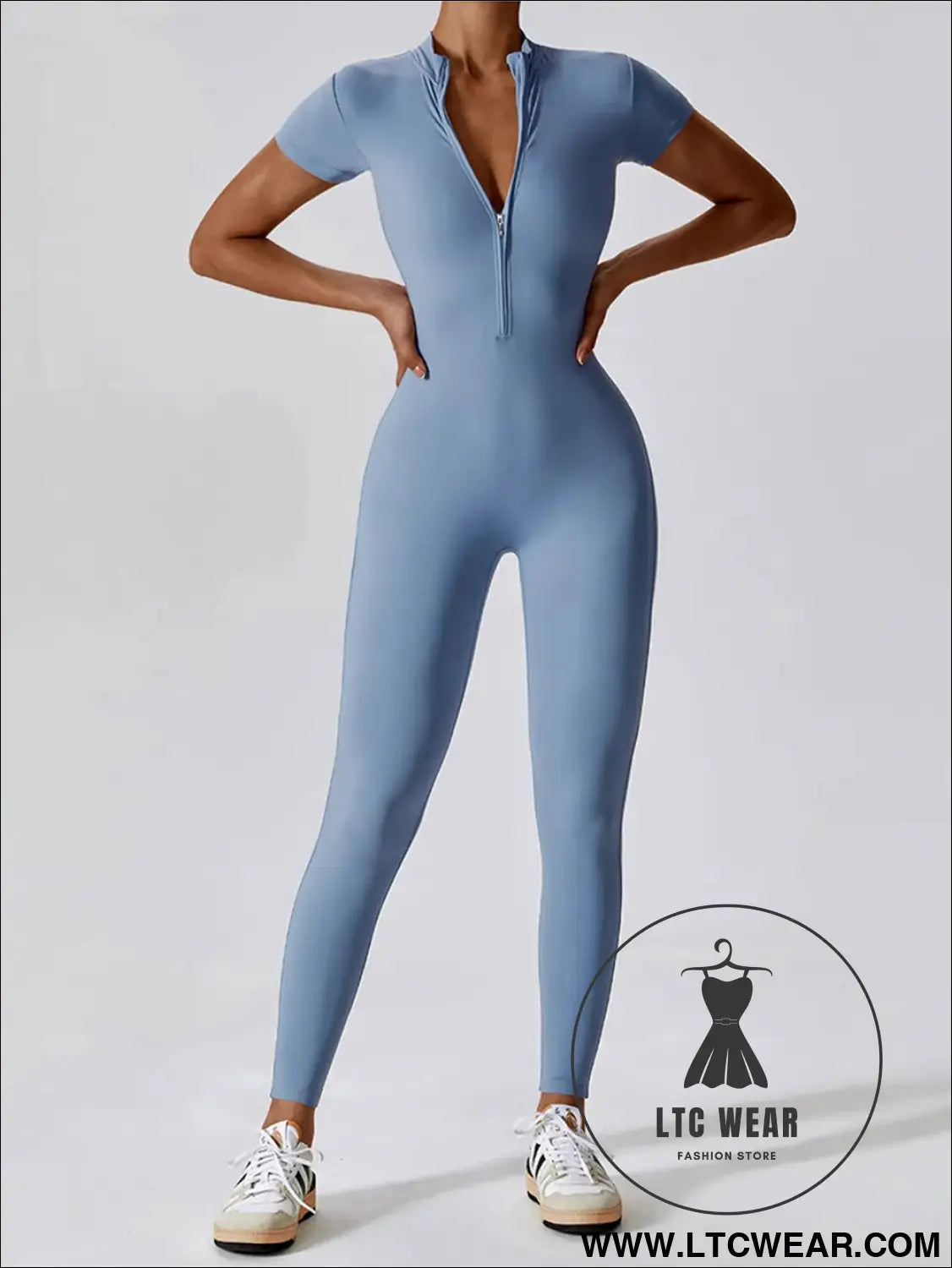 Short sleeve half zip active jumpsuit - light blue / s