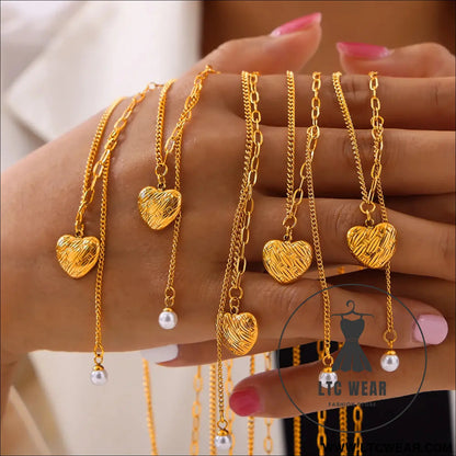 Titanium steel imitation pearl heart pendant necklace - gold / one size