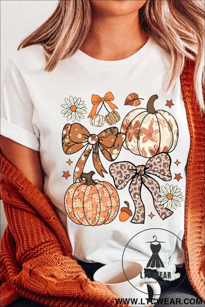 White unique leopard bow pumpkin graphic t shirt - white / 2xl / 62% polyester + 32% cotton + 6% elastane - graphic tees