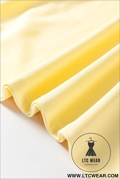 Yellow cream eyelet embroidered lace splicing sleeve loose t shirt dress - dresses/mini dresses